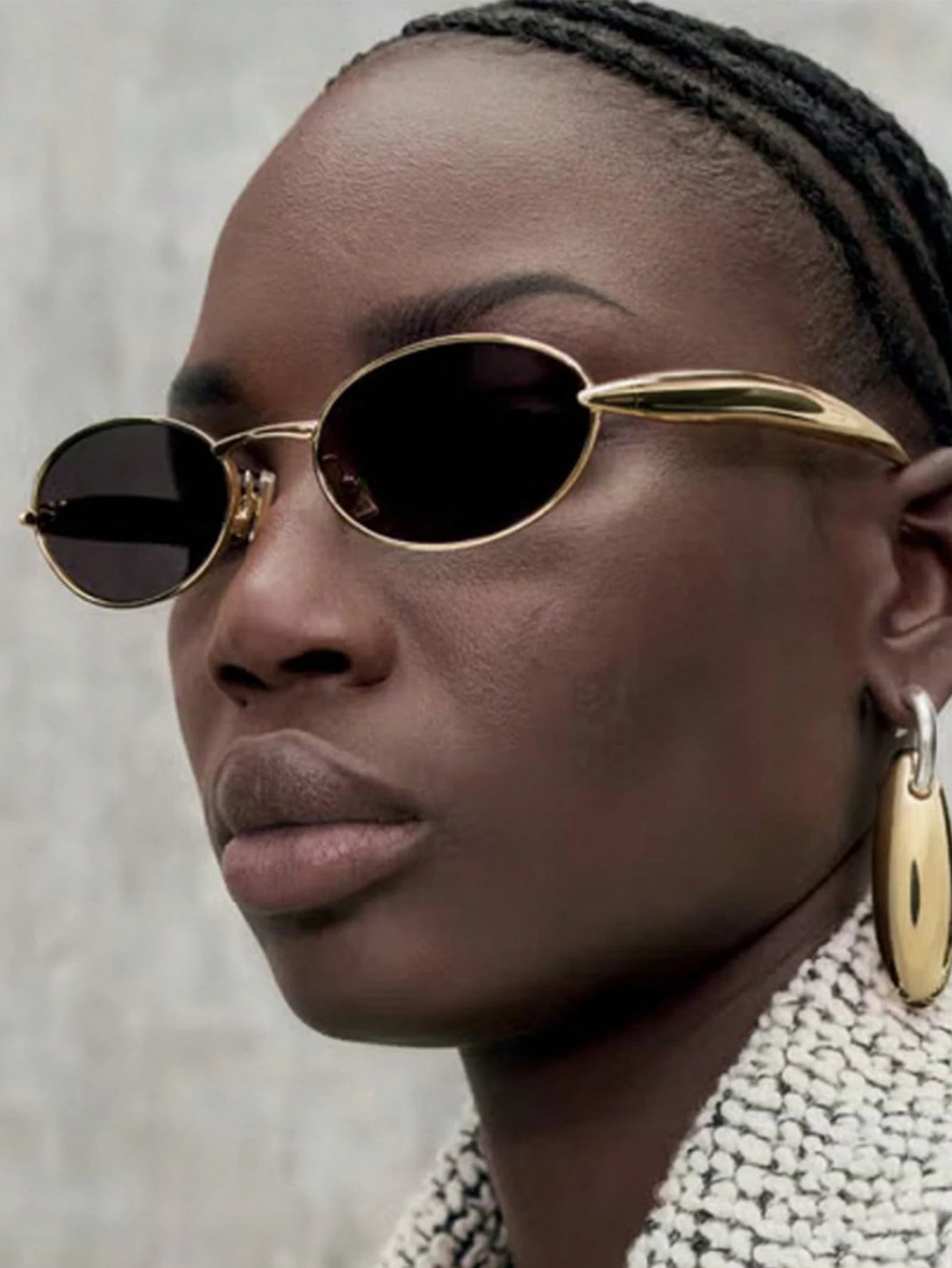 Trendy gold frame black lens oval sunglasses streetwear style