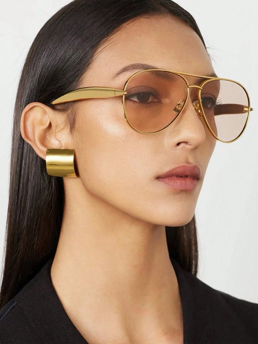 Gold frame aviator sunglasses with champagne tinted lenses
