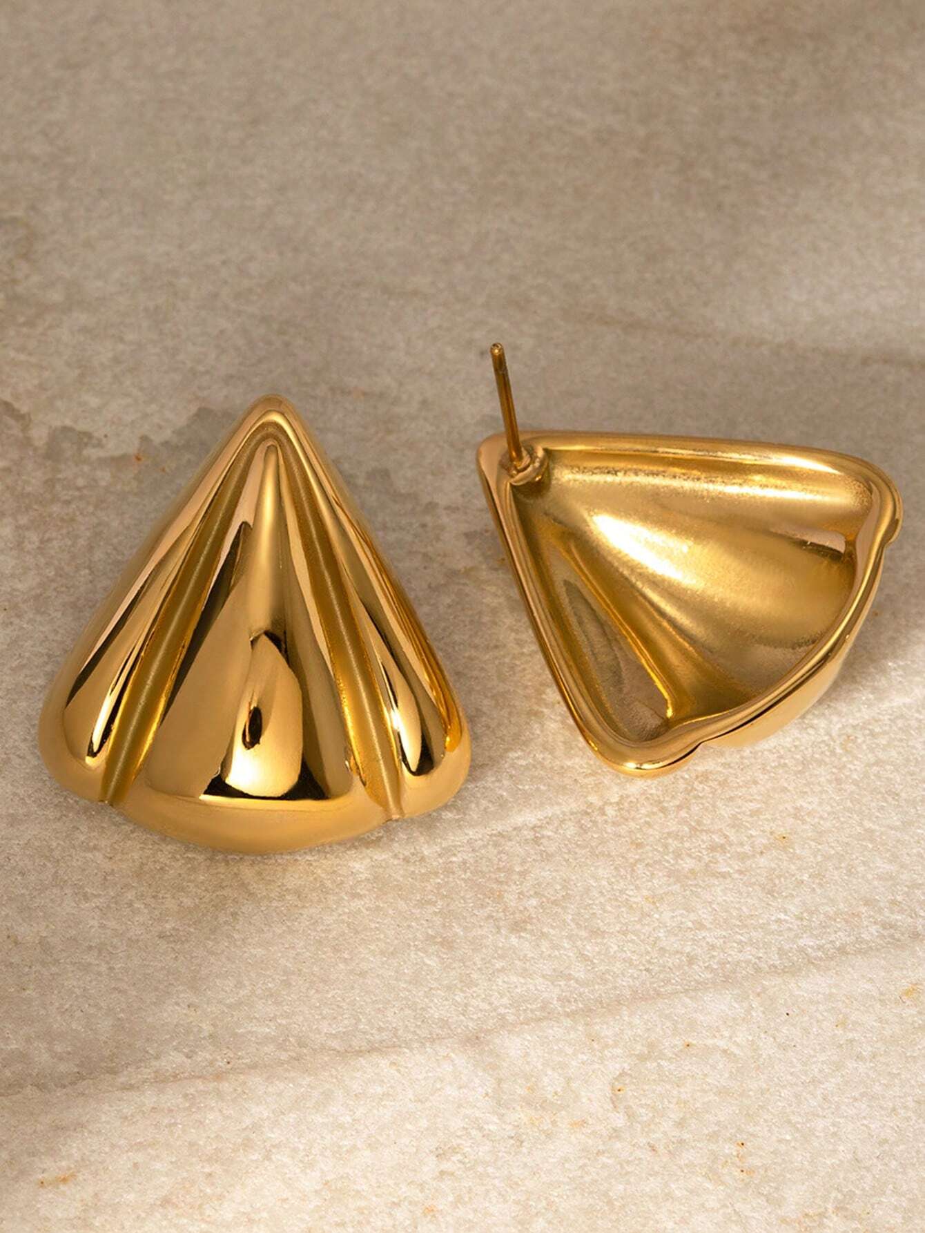 Gold-tone stainless steel earrings on model – trendy jewellery South Africa
