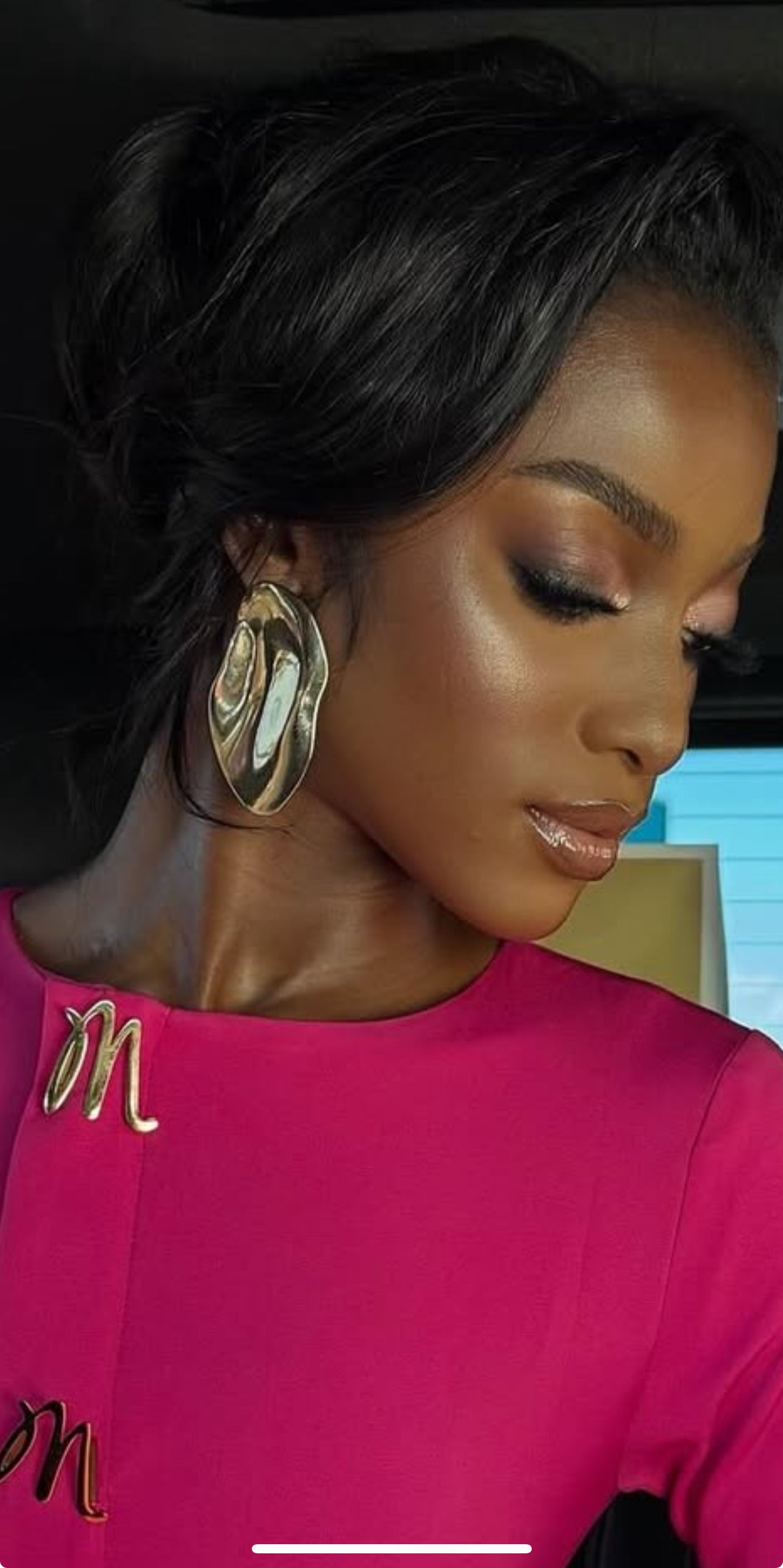 Model wearing gold asymmetrical stud earrings – Gillian & Co